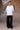 White poplin shirt with embroidered cut out sleeves for women by Genes Lecoanet Hemant India