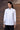 Women white designer shirt with geometric cutwork sleeve detailing, luxury fashion India